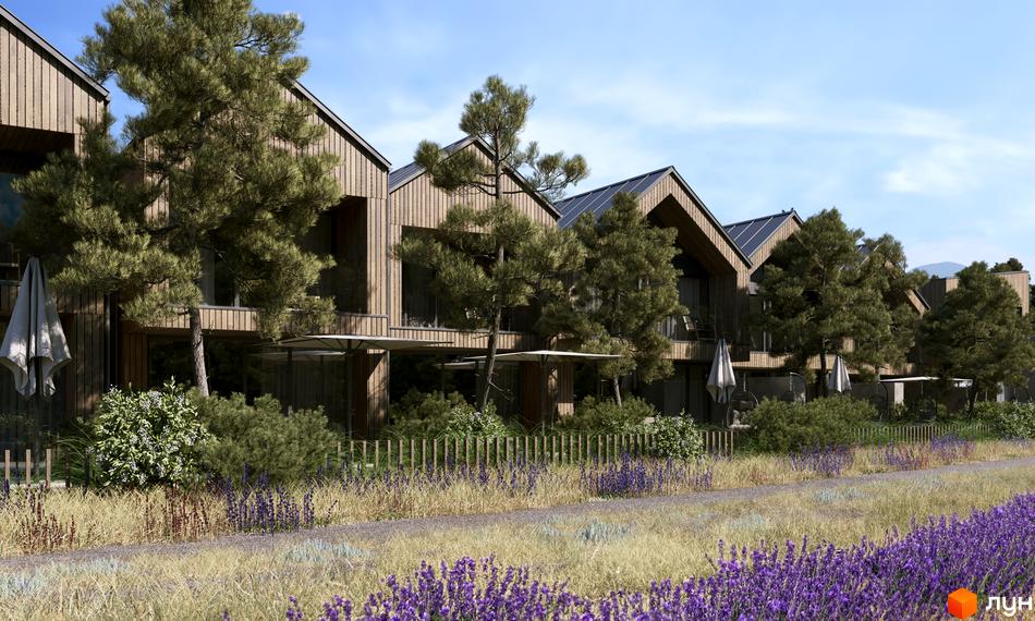 Котеджне містечко КМ Migovo Ski & SPA з дерев'яним фасадом та зеленими насадженнями. Територія комплексу з лавандовими полями та парковою зоною.