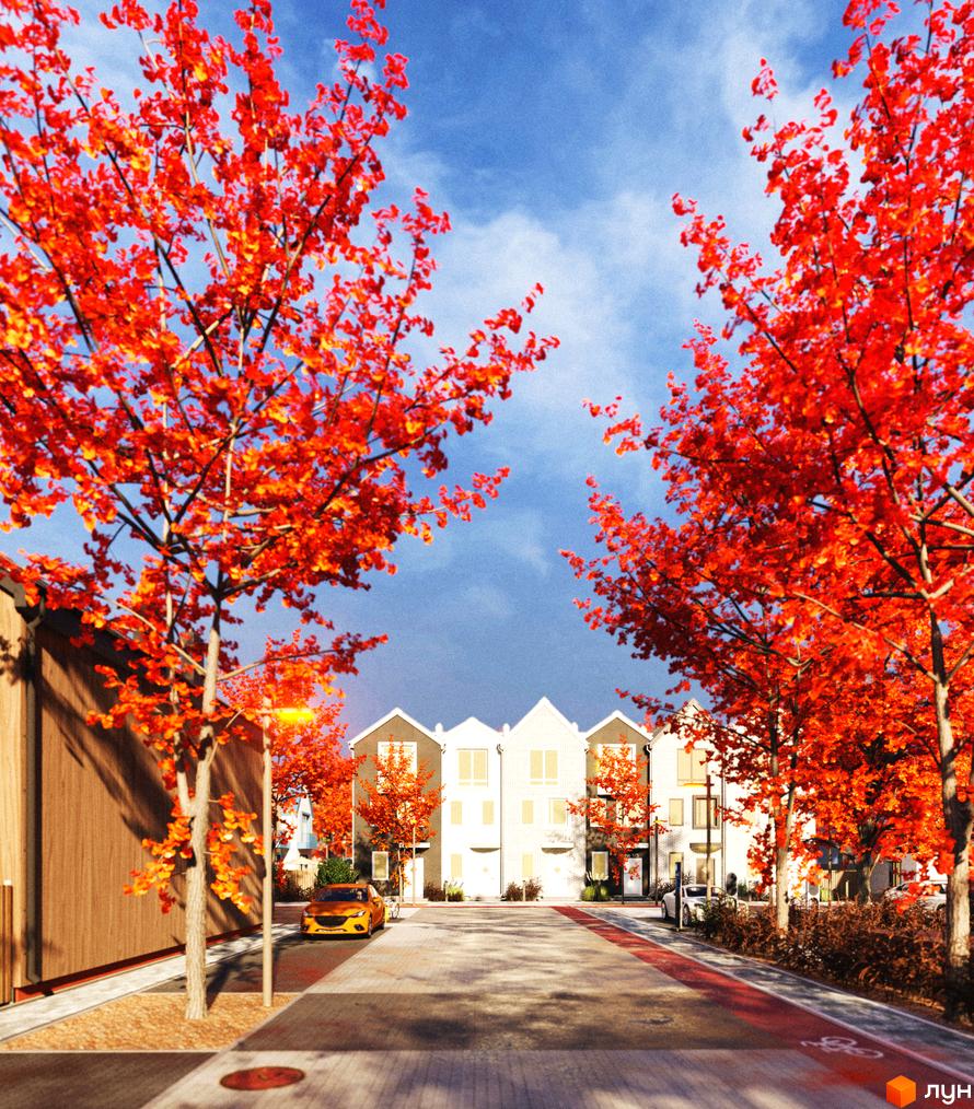 Таунхауси Sвій Dім 3: фасади будинків з червоним листям дерев на фоні блакитного неба та доглянутої прибудинкової території.