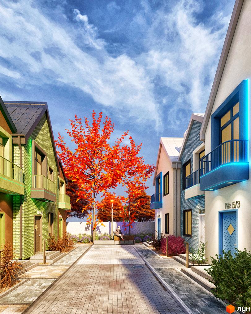 Таунхауси Sвій Dім 3: зелені та білі будинки з блакитними елементами та балконами, розташовані вздовж вулиці з бруківкою та деревами з помаранчевим листям.