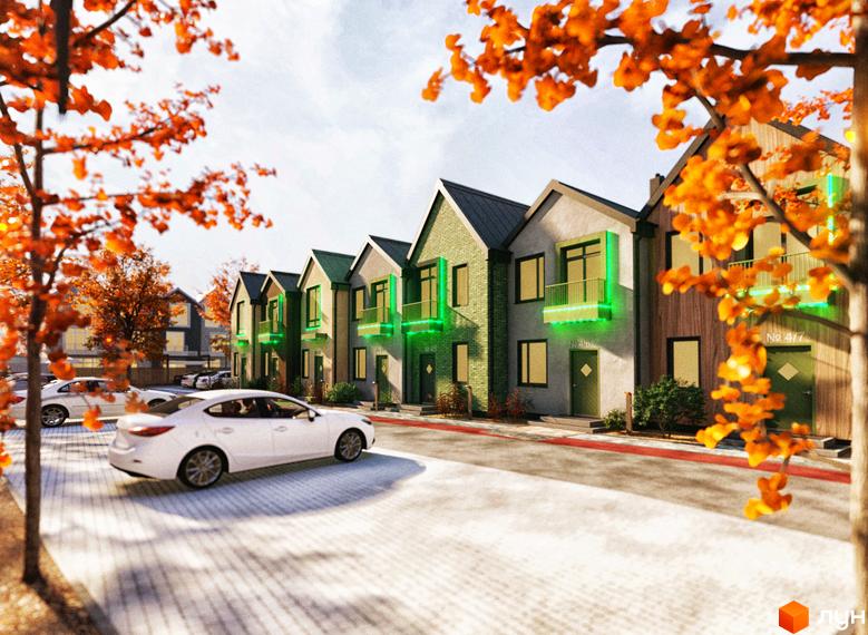 Таунхауси Sвій Dім 3: фасади будинків з зеленим підсвічуванням та прибудинкова територія з автомобілями восени.