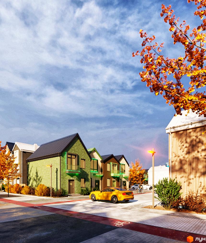 Таунхауси Sвій Dім 3: фасади будинків з цегли, прибудинкова територія з деревами та дорогою. Осінній пейзаж.