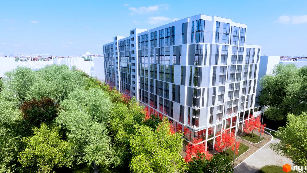 Зовнішній вигляд житлового комплексу Senat з великою кількістю вікон та зеленою прибудинковою територією. Навколо будівлі ростуть дерева з зеленим та червоним листям.