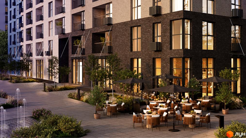 Житловий комплекс Sense City з цегляним фасадом та затишною терасою з парасольками та освітленням. Навколо зелені насадження та фонтан.