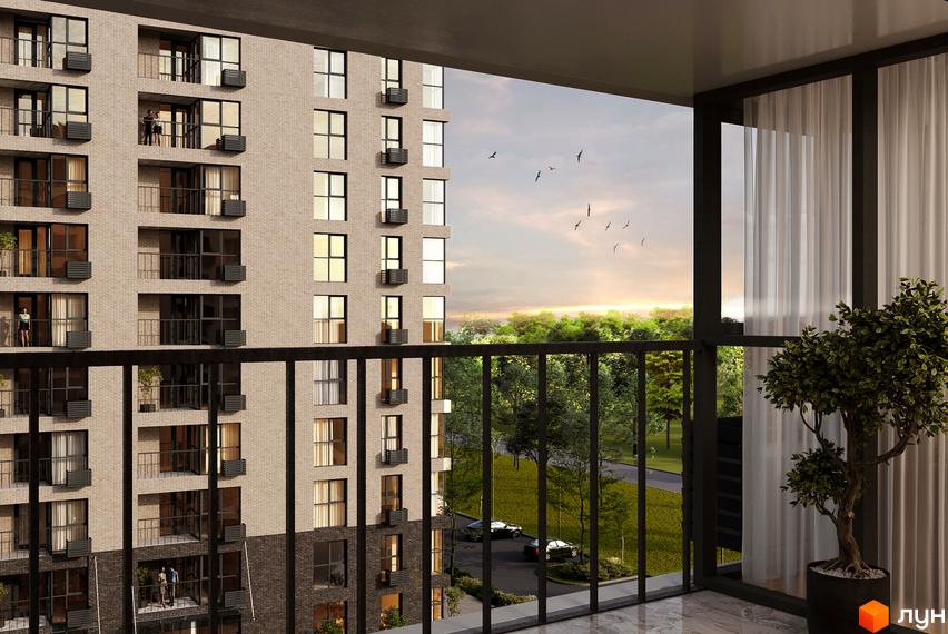 Вид з балкона на багатоповерховий житловий комплекс Sense City з цегляним фасадом та вікнами. На прибудинковій території видно дерева та автомобілі.