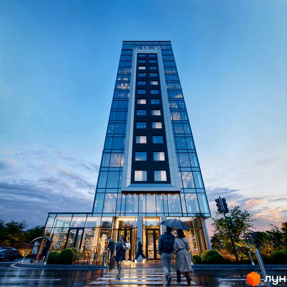 The Five Hotel - це висотна новобудова з панорамним склінням та центральним темним фасадом. Перед комплексом розташована доглянута прибудинкова територія з пішохідним переходом та деревами.