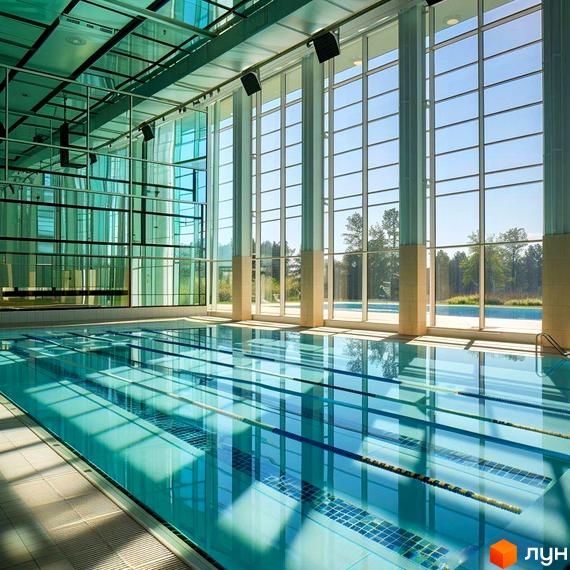 Басейн у житловому комплексі Prostir з великими панорамними вікнами, що виходять на зелену територію. Ідеальне місце для відпочинку та спорту.