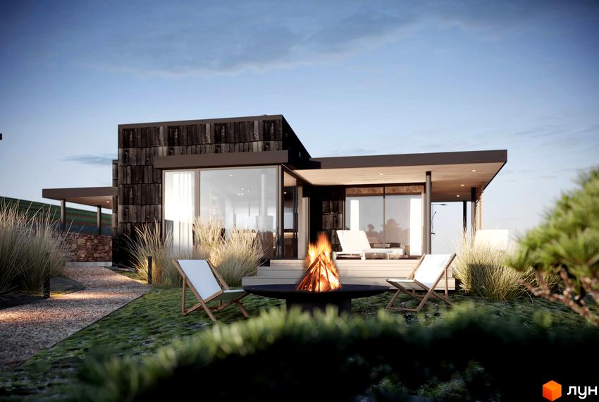 Котеджне містечко BARVY з дерев'яною обшивкою та великими вікнами, з зоною відпочинку з багатьом та кріслами на тлі зеленої трави та кущів.