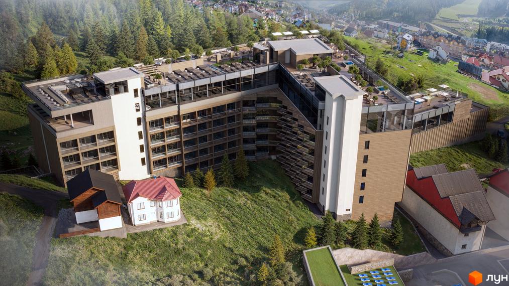 Фото GRAND SPA RESORT AND CONFERENCE. Вигляд на багатоповерховий будинок з великими вікнами та прибудинкову територію.