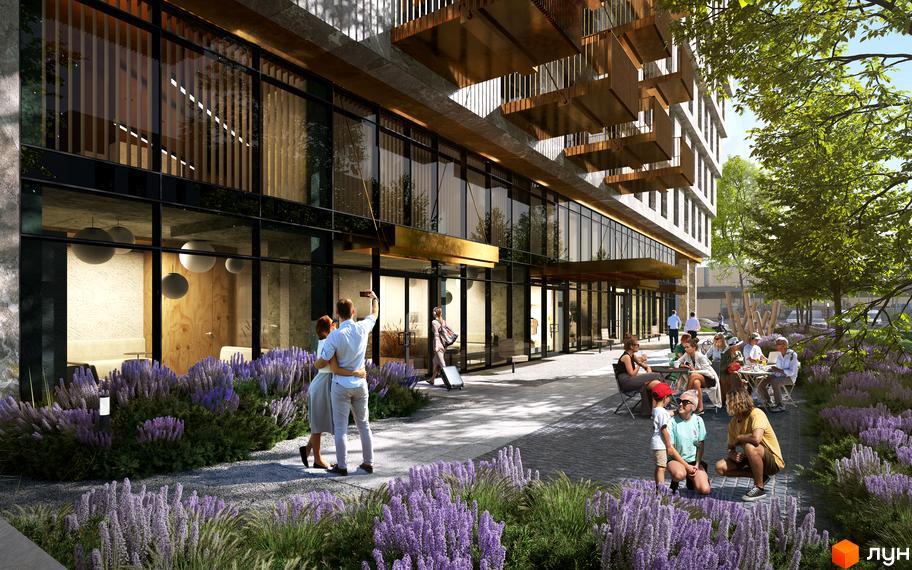 Зовнішній вигляд новобудови Quoroom FLY з великими вікнами та балконами, прибудинкова територія з лавандовими кущами та місцями для відпочинку.