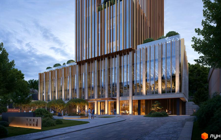 Зовнішній вигляд новобудови THE ONE з дерев'яними та скляними елементами фасаду, зеленою зоною та вхідною групою. Територія навколо комплексу з доріжками та освітленням.