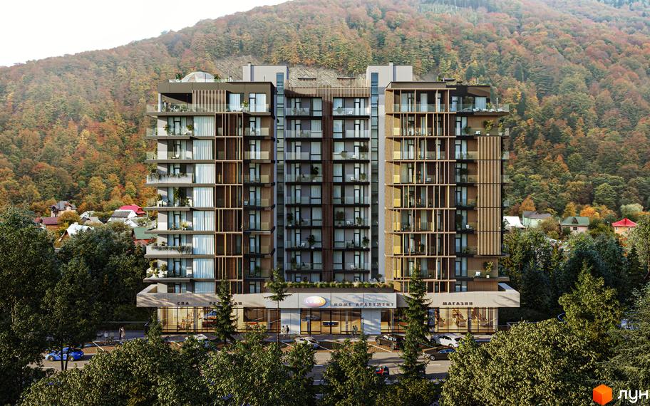 Житловий комплекс Logos Home Apartment з фасадами з дерева та скла, розташований на тлі гір та осіннього лісу. Перед будинком облаштована парковка та зелена зона.