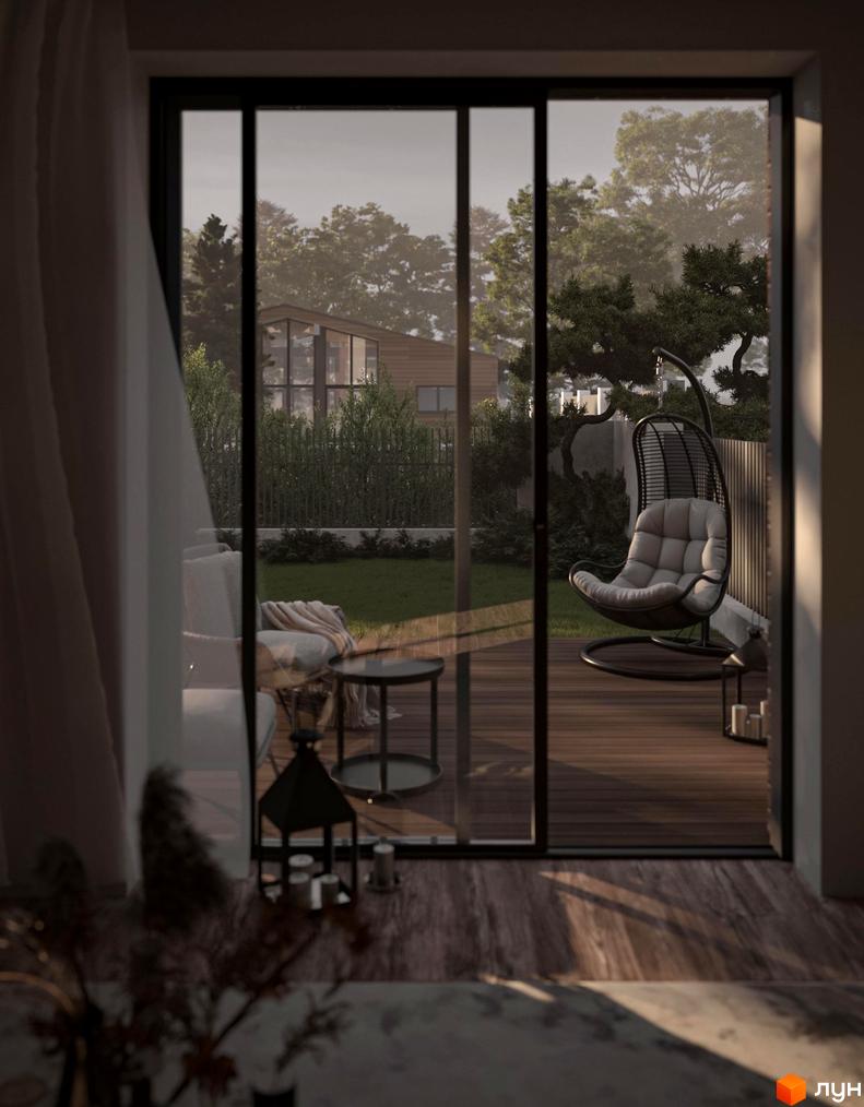 Таунхауси Loft House з великими вікнами та терасою, що виходить на зелений двір з підвісним кріслом. Сучасна архітектура та затишна атмосфера.