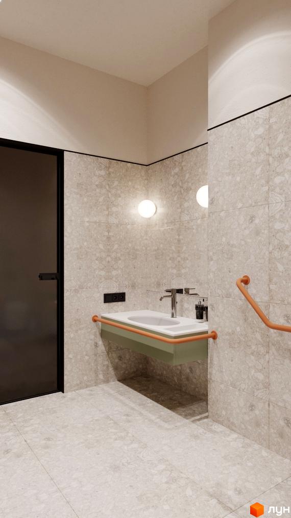 Інтер'єр ванної кімнати в апарт-готелі WOL Vinnytsia. Світлі стіни з великою плиткою, раковина з тумбою, поручні.