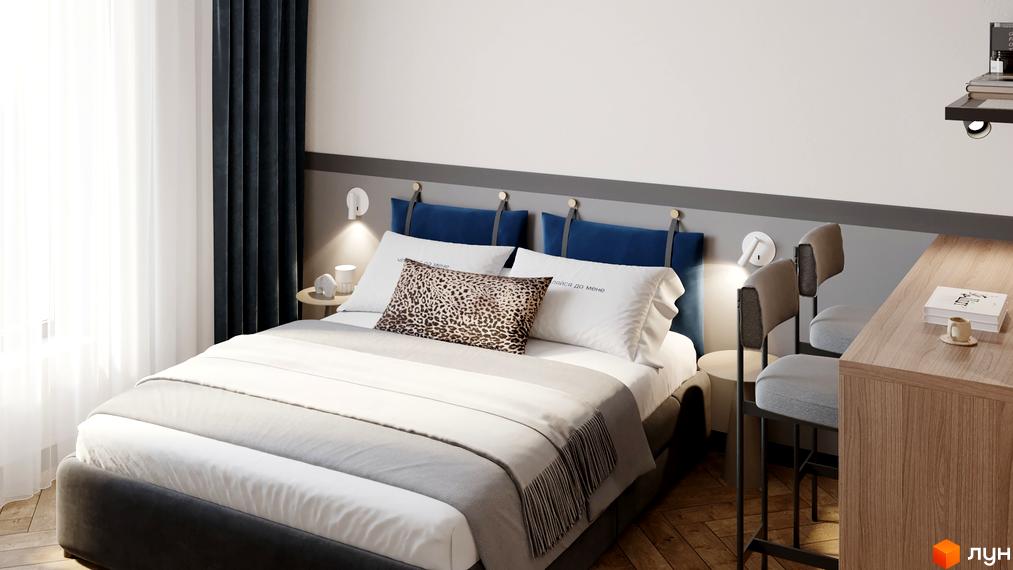 Затишна спальня в апарт-готелі WOL Vinnytsia з великим ліжком, подушками та тумбочкою. Світлий інтер'єр з акцентом на деталі.