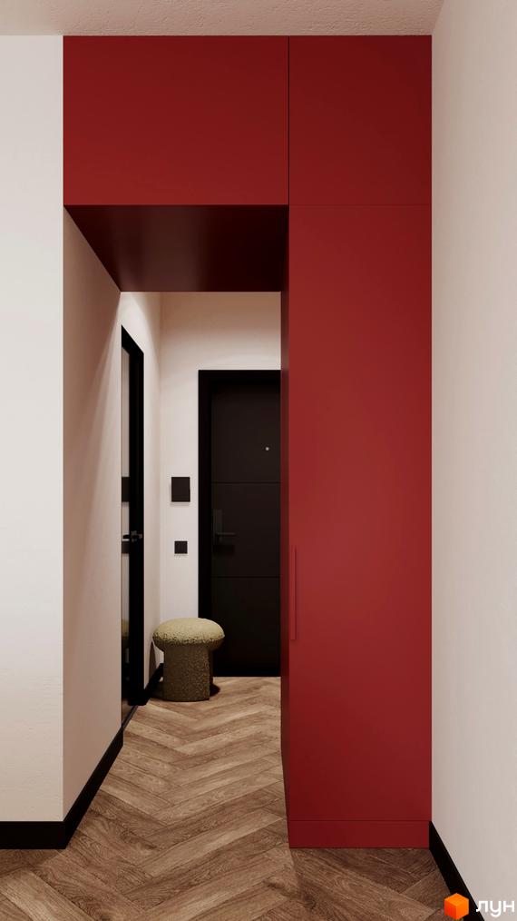 Інтер'єр коридору в апарт-готелі WOL Vinnytsia. Стіни білого кольору, двері чорні, підлога з дерев'яним візерунком, шафа червоного кольору.