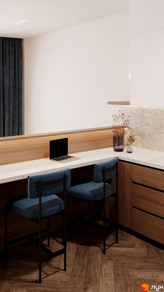 Інтер'єр апартаментів в Апарт-готелі WOL Vinnytsia з робочою зоною, стільцями та ноутбуком на столі. Дерев'яна підлога та оздоблення створюють затишну атмосферу.
