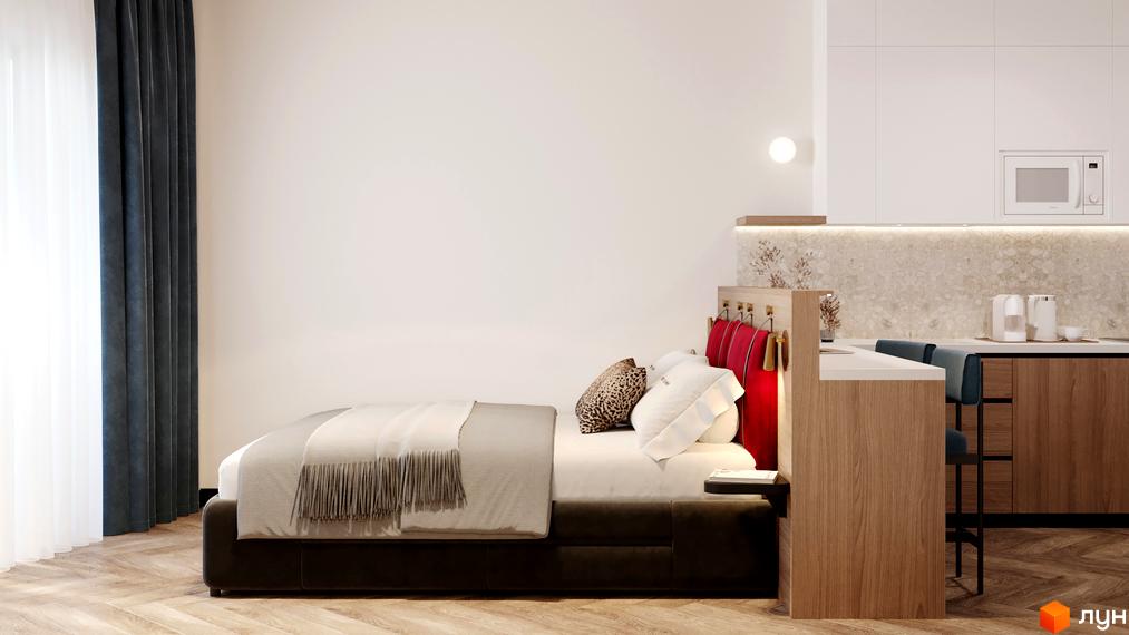 Інтер'єр спальні в апарт-готелі WOL Vinnytsia. Простора кімната з ліжком, шторами та кухонною зоною з барною стійкою.