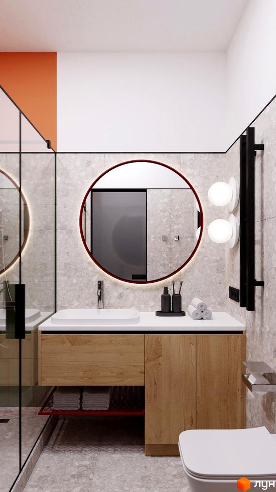 Інтер'єр ванної кімнати в апарт-готелі WOL Vinnytsia. Кругле дзеркало з підсвіткою, дерев'яні меблі, світлі стіни та підлога.