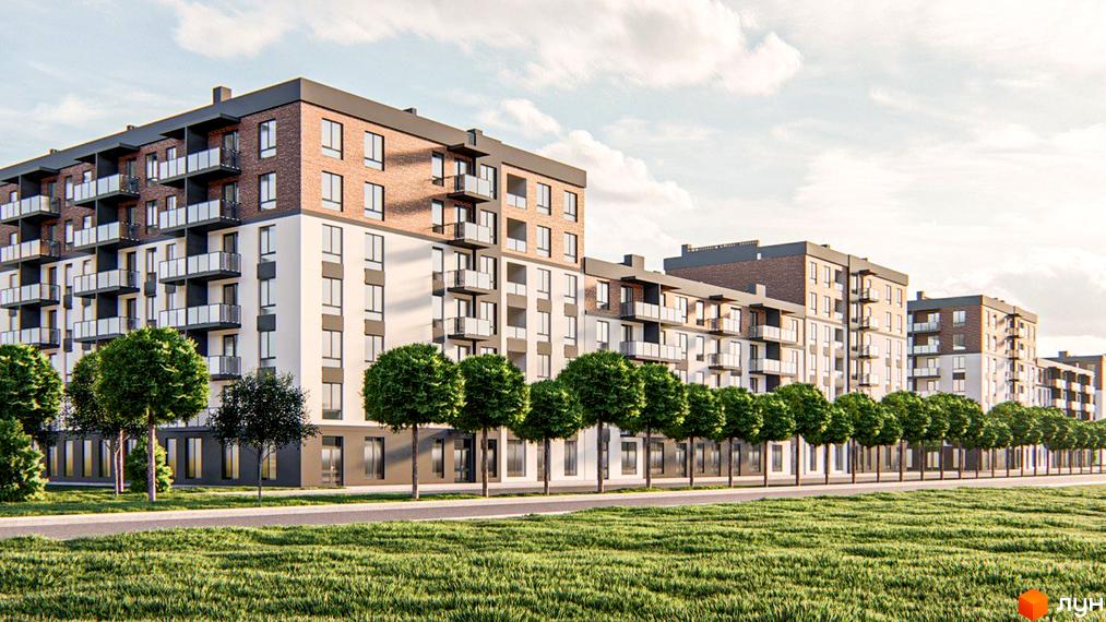 Багатоповерховий будинок ЖК Burgundia 3 з цегляним фасадом та балконами. На передньому плані зелена трава та дерева.