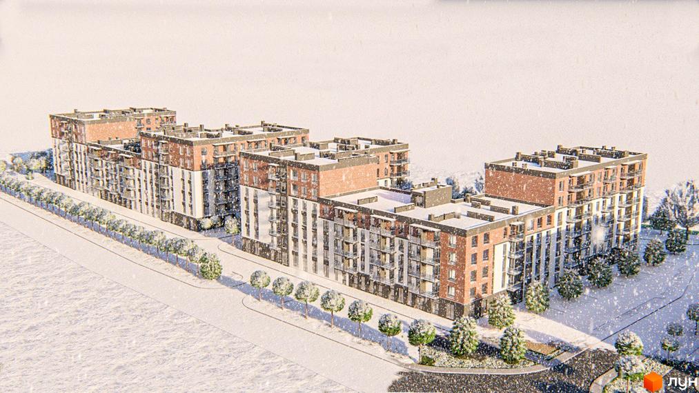 Зимовий вигляд ЖК Burgundia 3: багатоповерхові будинки з цегляними фасадами та доглянута прибудинкова територія з деревами.