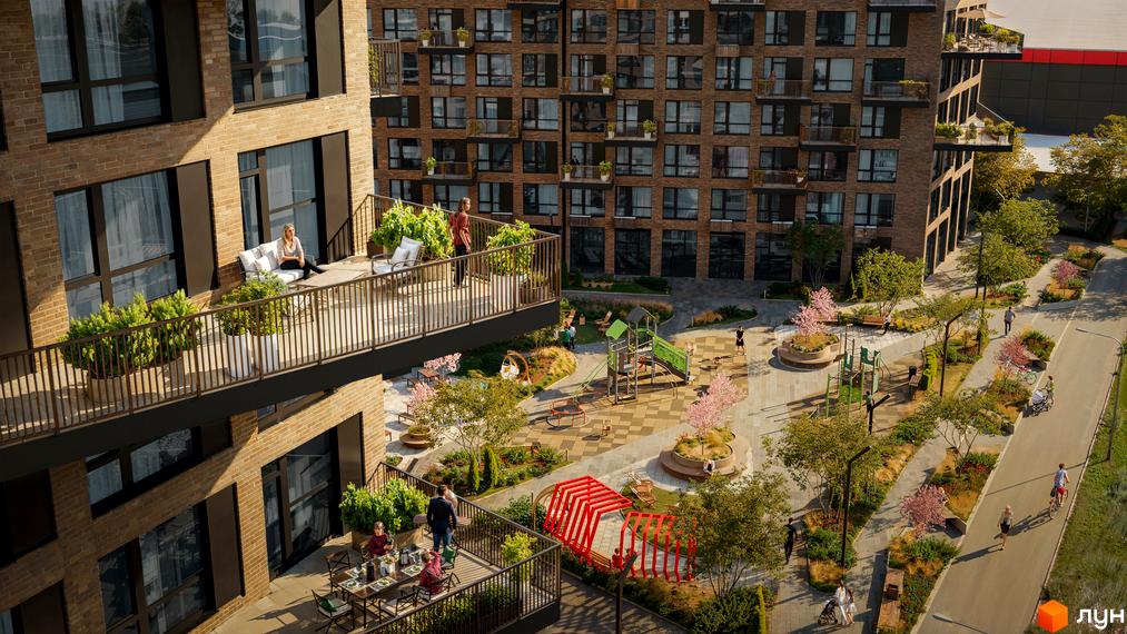 Житловий комплекс The TENTH House з цегляними фасадами та просторими балконами, що виходять на зелене подвір'я з дитячим майданчиком та зонами відпочинку.