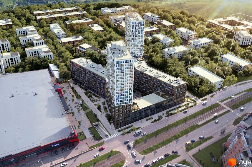 Вид згори на житловий комплекс The TENTH House з багатоповерховими будинками та прибудинковою територією з деревами та дорогою.