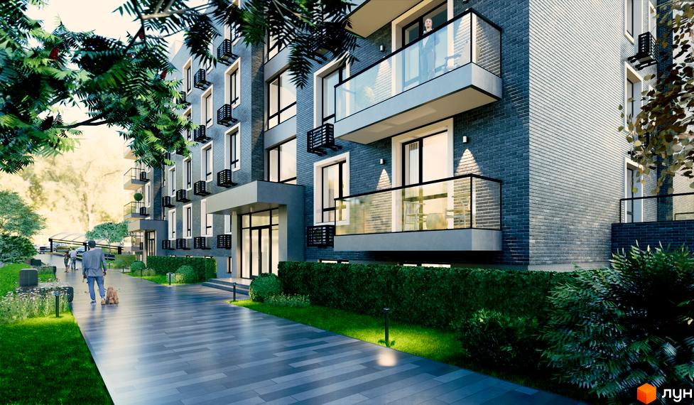 Зовнішній вигляд житлового комплексу Sovskyi Club House з сірої цегли та скляними балконами. Поруч доглянута прибудинкова територія з зеленню та доріжками.