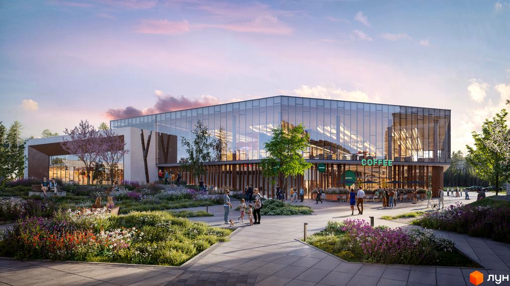 Велика скляна будівля з написом 