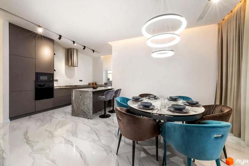 Інтер'єр кухні-вітальні в житловому комплексі КМ Парк Хаус. Сучасний дизайн з обідньою зоною та кухонним островом.