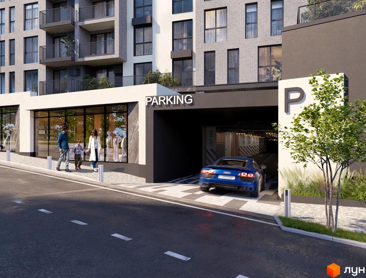 Зовнішній вигляд новобудови ЖК Grand Hills з в'їздом у паркінг та пішохідною зоною. Навколо комплексу розташовані зелені насадження та дорога.