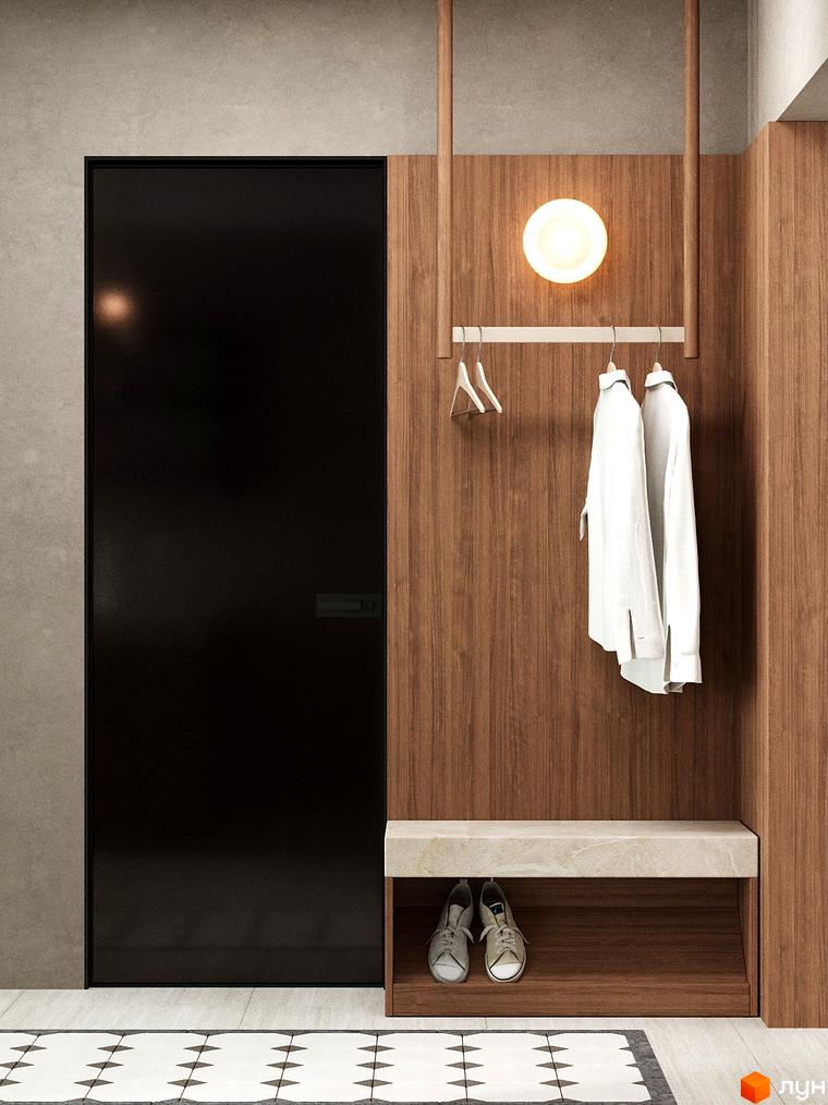 Передпокій житлового комплексу Erwin Hall з чорними дверима, дерев'яною обробкою та вбудованими меблями для зберігання.