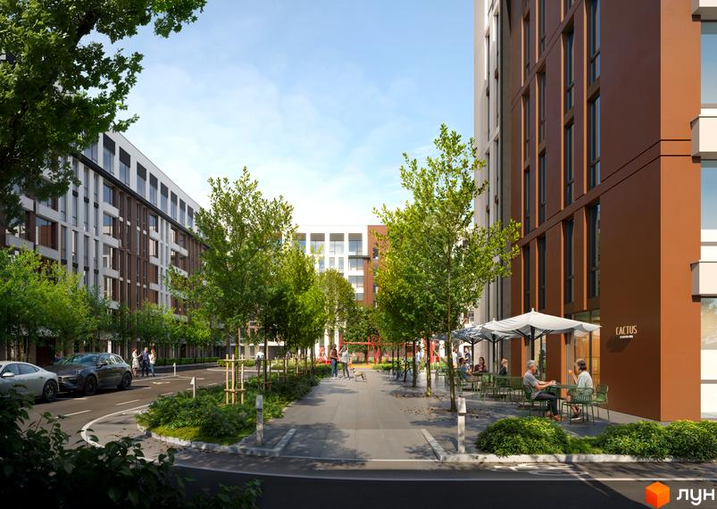 Зовнішній вигляд житлового комплексу Smart City з коричневими та сірими фасадами, що оточує зелену прибудинкову територію з деревами та місцями для відпочинку.