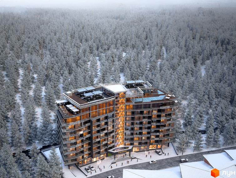 Апарт-комплекс KARDAMON RESORT & SPA у зимовому лісі. Будівля має багатоповерхову структуру з панорамними вікнами та терасами на даху.