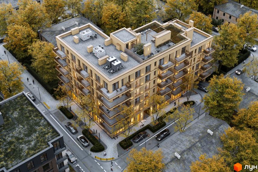 Житловий комплекс Avalon Yard Club з жовтим фасадом та численними балконами, оточений деревами з осіннім листям та доглянутою прибудинковою територією.