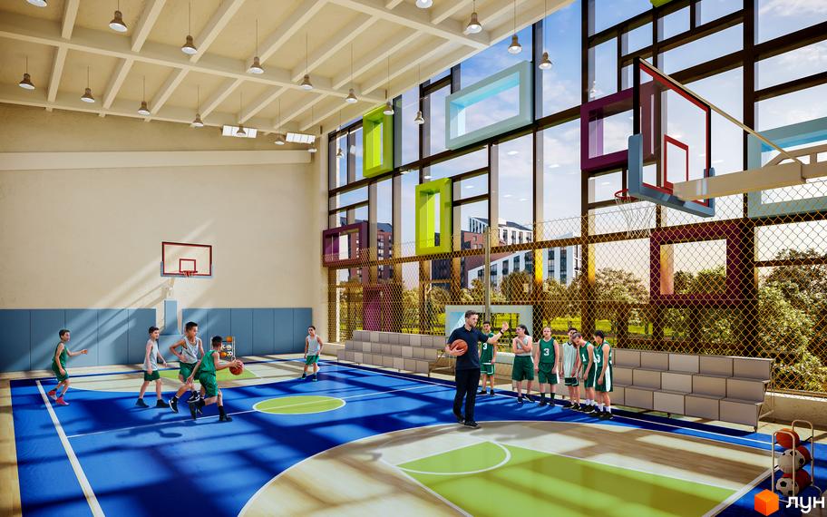 Спортивний зал у Житловому комплексі Paradise Avenue. Баскетбольний майданчик з великими вікнами та командою гравців.