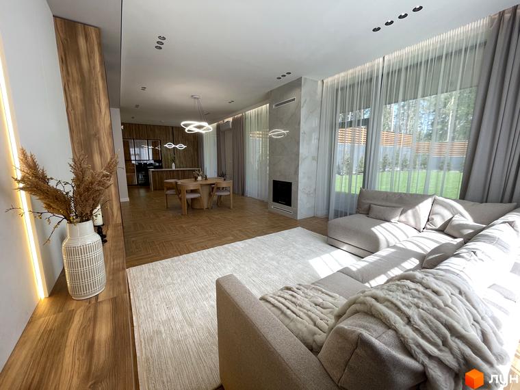 Інтер'єр житлової кімнати з кутовим диваном, обідньою зоною та великими вікнами у Котеджному містечку Нова Ходосівка.