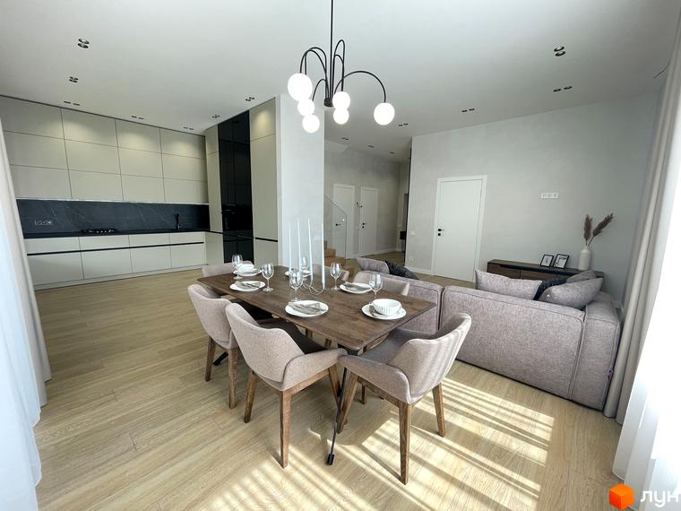 Інтер'єр кухні-вітальні в Котеджному містечку Нова Ходосівка з обіднім столом, диваном та кухонним гарнітуром.