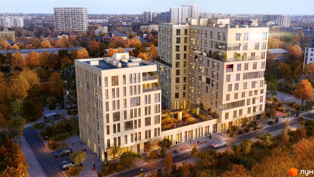 Зовнішній вигляд житлового комплексу GLOBUS BALANCE з сучасними фасадами та прибудинковою територією з деревами восени. Комплекс має багато вікон та балконів.