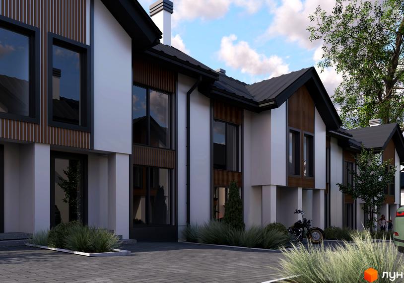 Зовнішній вигляд котеджного містечка KМ Spokiy Avenue з білими фасадами та дерев'яними елементами, облаштована прибудинкова територія з бруківкою та зеленню.