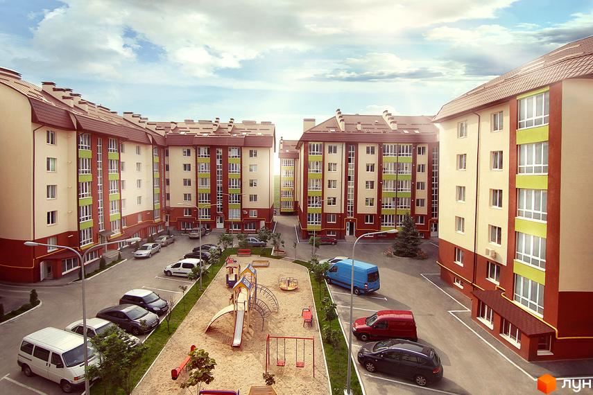 Житловий комплекс Львівський маєток із цегляними фасадами та зеленими вставками. На прибудинковій території розташований дитячий майданчик та парковка.