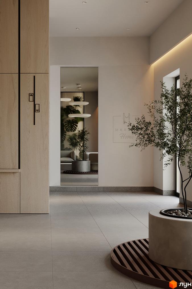Інтер'єр Житлового комплексу MARVEL Home: світла вхідна зона з дерев'яними панелями, дзеркалом, рослинами та сірою плиткою на підлозі.