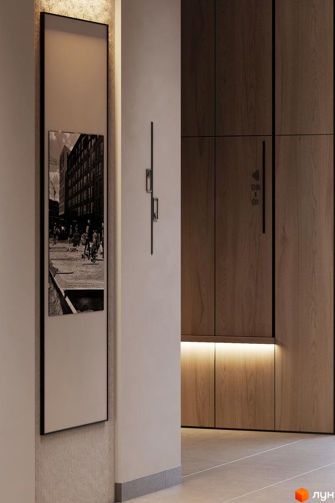 На екрані в холі Житлового комплексу MARVEL Home відображено чорно-біле зображення будівельного майданчика та міського пейзажу.