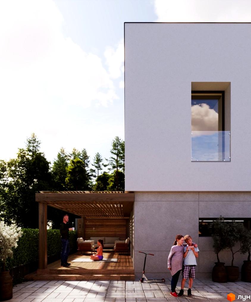 Зображення будинку Котеджного містечка Полтавський Двір з терасою та дітьми на подвір'ї. Вигляд фасаду та ландшафтного дизайну.