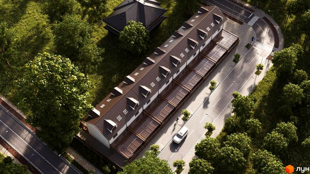 Вид зверху на таунхауси S8 з коричневим дахом та білими стінами. Поруч дорога, зелені дерева та доглянута територія.