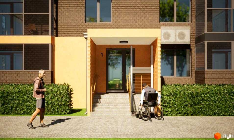 Фасад будинку в Житловому комплексі Видовий з входом для людей з інвалідністю. Навколо будинку зелені насадження та пішохідна зона.