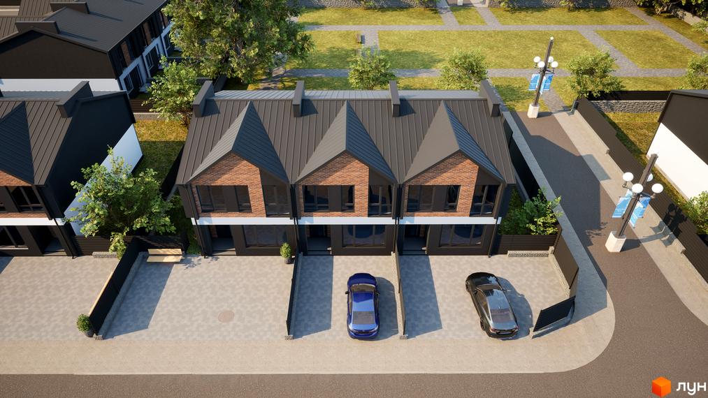 Вигляд котеджів у Котеджному містечку West House Park з темними дахами та цегляними фасадами. На території є парковка для автомобілів.
