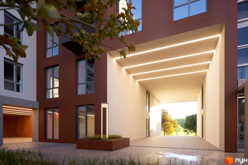Новобудова ЖК САБ Борислав з підсвіченим проходом та зеленим подвір'ям. Зовнішній вигляд будинку з червоною та білою фасадною частиною.