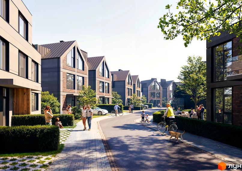 Котеджне містечко Concept Riviera: сучасні будинки з двосхилими дахами та доглянута прибудинкова територія з доріжками та зеленню.