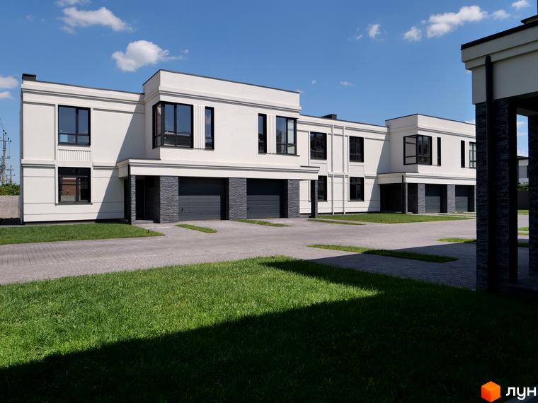 Білі будинки з темними гаражними дверима та вікнами на фоні блакитного неба. Перед будинками бруківка та зелена трава.