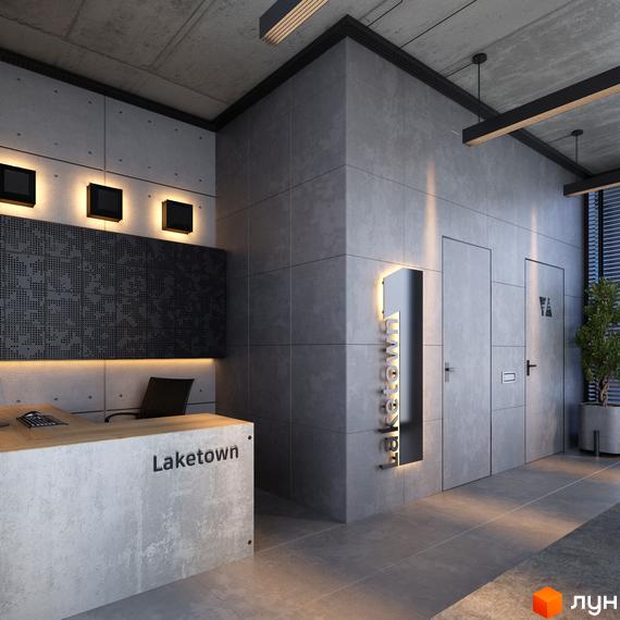 Сучасний інтер'єр холу житлового комплексу LAKETOWN з рецепцією та дверима. Оздоблення стін сірою плиткою та бетонними елементами.